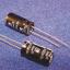 ECAP 1000uF/16V 1021 105C RH конденсатор алюминиевый электролитический радиальный; 1000мкФ; 16В; 10x20мм; P=5мм